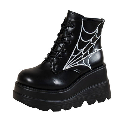 Bottines femme noires à lacets avec semelle compensée et motif toile d’araignée