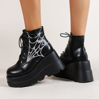 Bottines femme noires à lacets avec semelle compensée et motif toile d’araignée vue arrière
